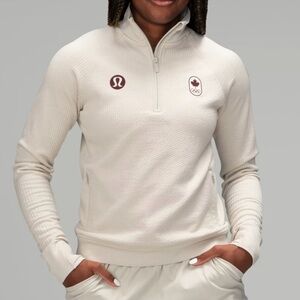 Lululemon Team Canada Olympics Engineered
Warmth half-zip sweatshirt Size 4 Rare
